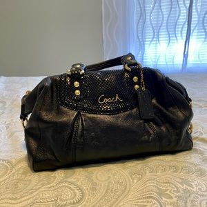 Black leather Coach purse.